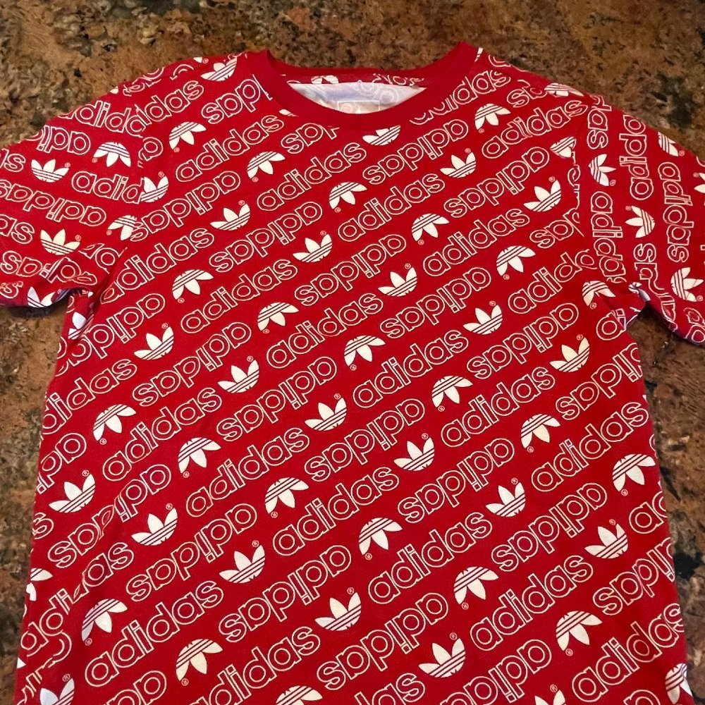 Red and white Adidas T-Shirt with Adidas emblem pattern